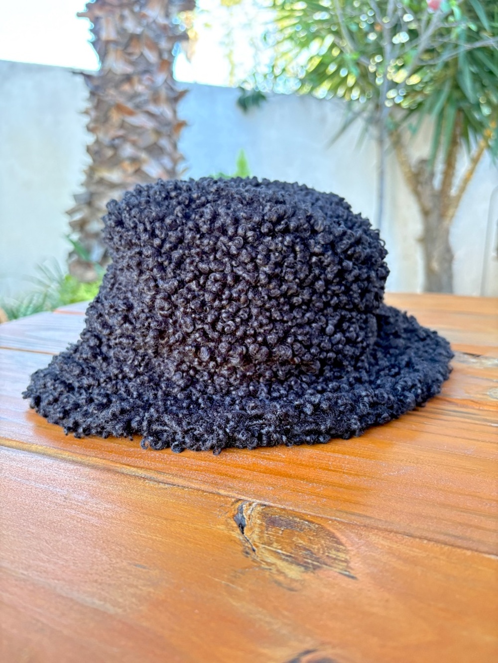 Bucket Hat in Black with a Curly Plush Texture Adjustable